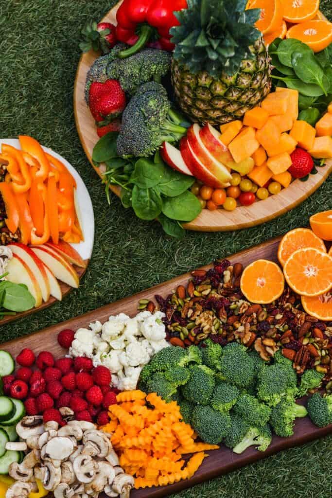 sliced orange fruits on brown wooden tray is an example of good foods on the insulin resistance diet plan free for download.
